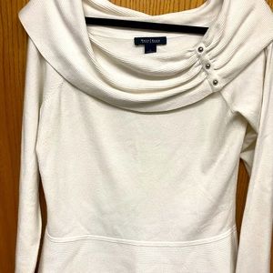 Off white sweater worn off the shoulder.